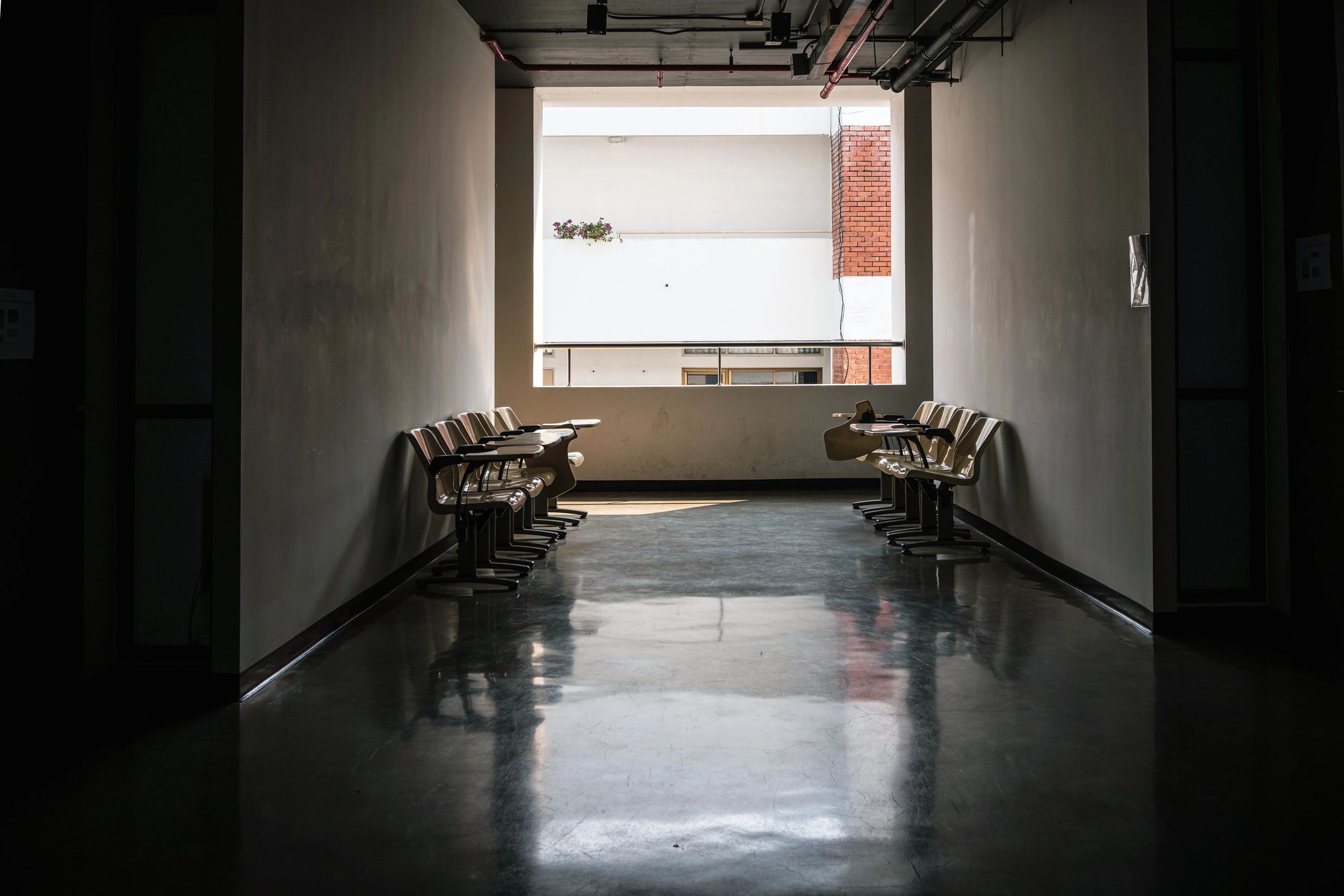 Bright corridor with sunlight through windows
